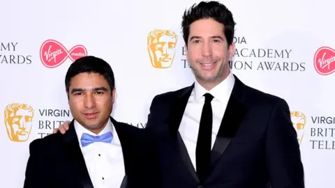 PA Media Nick Mohammed and David Schwimmer