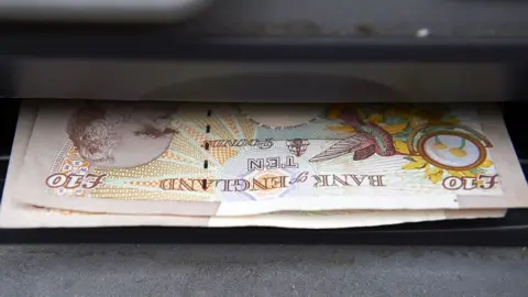 Getty Images Money in a cash machine