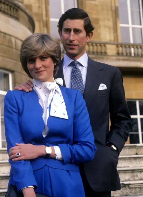 PA Charles and Lady Diana Spencer at Buckingham Palace after the announcement of their engagement.