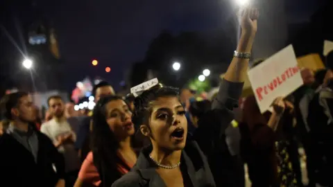 Getty Images A protestor opposing the suspension of Parliament