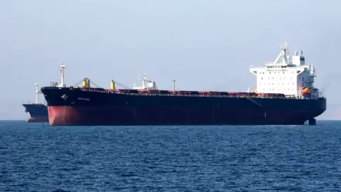 AFP An oil tanker in the Strait of Hormuz, near the Iranian port of Bandar Abbas (30 April 2019)