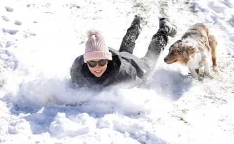 Ron Jenkins / Getty Images Megan Pennartz and her dog