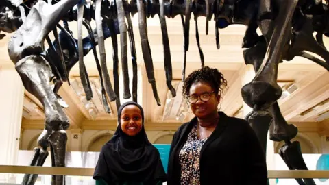 Schoolgirl Zowda Ismail and teaching assistant Carol Caseman