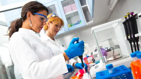 Getty Images Scientists in a lab