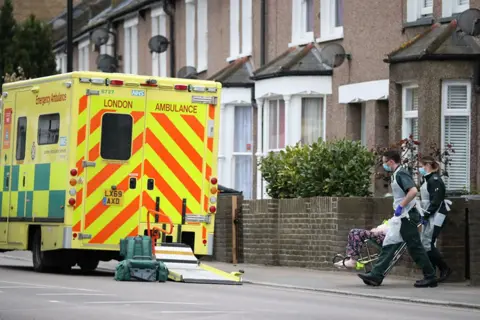 Hannah McKay / Reuters Paramedics in Lewisham