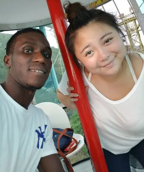 Louise Chan Footballer Solomon and his girlfriend Louise pose for a smiling selfie together