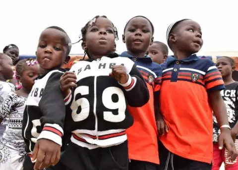 AFP Twins pose during Twins Day celebration on September 8, 2018 in Abobo, suburb of Abidjan