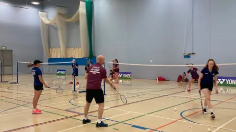 BBC/Tom Williams Yana (right) plays on court at Suffolk One five times a week