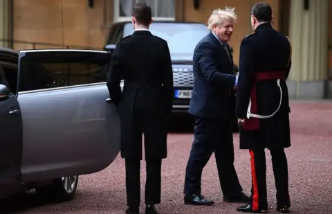 PA Media Boris Johnson arriving at Buckingham Palace