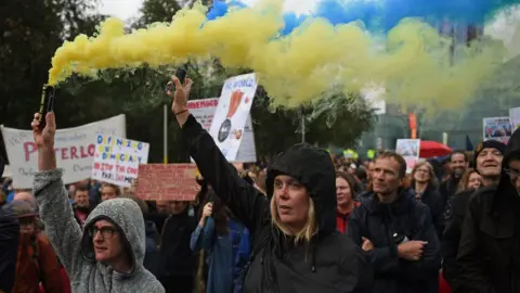 Getty Images Protesters in Manchester