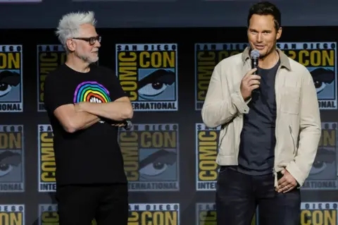 Getty Images James Gunn and Chris Pratt on stage at San Diego Comic-Con