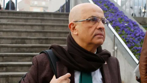 Reuters Enis Berberoglu, a lawmaker from the main opposition Republican People's Party (CHP), arrives at the Justice Palace, the Caglayan courthouse, to attend a trial in Istanbul, Turkey March 1, 2017.