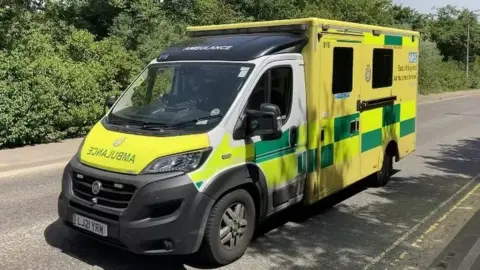 Matt Precey/BBC An ambulance on the road