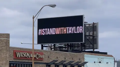 Twitter / HSpalding13 Taylor Swift's fans paid for billboards supporting the star to appear outside the headquarters of Big Machine Records