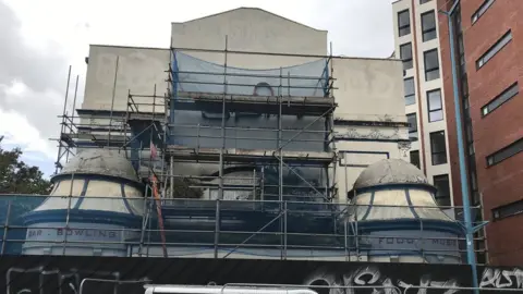 The former Gaiety Grand Cinema, on City Road, surrounding in scaffolding