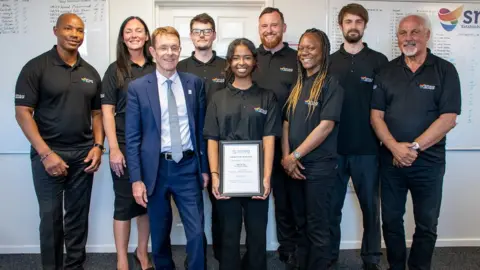 WMCA Andy Street, Mayor of the West Midlands and Chair of the WMCA, meets with staff at SNSG at a recent Commonwealth Games event.