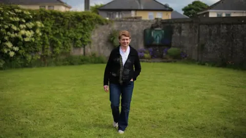 PA Catherine Corless at the site in 2014