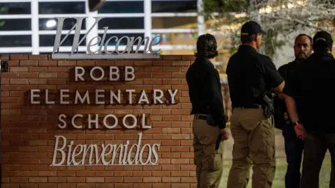 Getty Images Officers outside Robb Elementary School