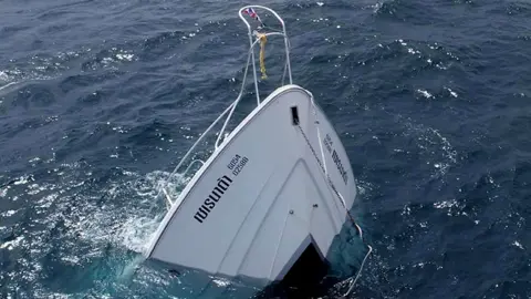 Shutterstock A tourist boat after it capsized off the coast in Phuket Island, southern Thailand