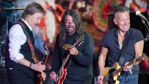 Getty Images Paul McCartney performs with Bruce Springsteen and Dave Grohl as he headlines the Pyramid Stage during day four of Glastonbury Festival at Worthy Farm