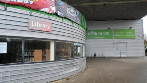 BBC West Swindon Library at the Link Centre with metal exterior and a long, low window.