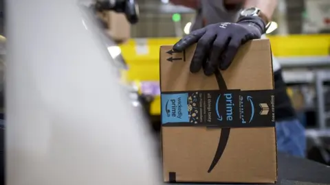 Getty Images A worker boxes orders at the Amazon Fulfillment Center on August 1, 2017 in Robbinsville, New Jersey.