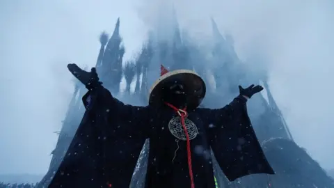 Reuters A Flaming Gothic art project marks the Maslenitsa holiday at the Nikola Lenivets art park, near Kaluga, on 17 February 2018.