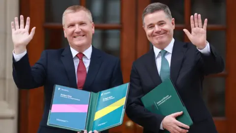 Minister for Finance Michael McGrath and Minister for Public Expenditure Paschal Donohoe (right) arrive at Leinster House in Dublin