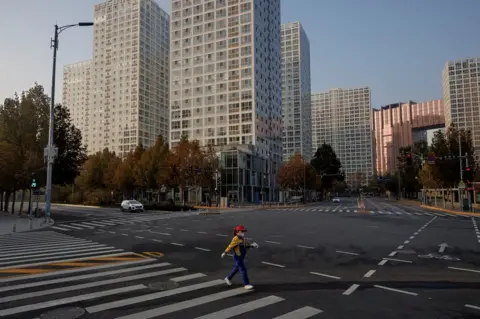 Getty Images A deserted street in Beijing amid Covid restrictions in November 2019