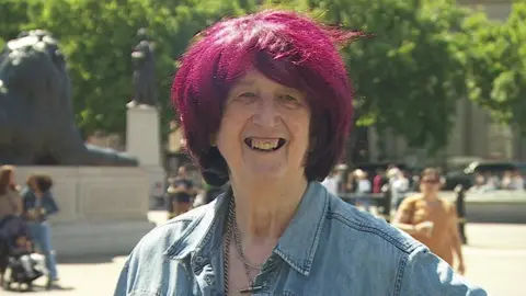 BBC NEWS Roz Kaveney smiles at the camera