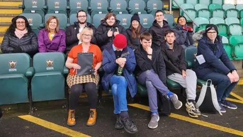 West Northamptonshire Council Participants in the project sitting in seats at Franklins Gardens