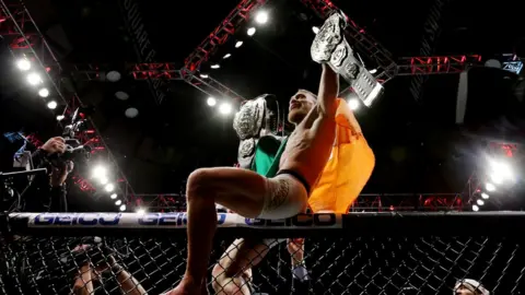 Getty Images Conor McGregor celebrating his UFC lightweight championship victory over Eddie Alvarez in November 2016.