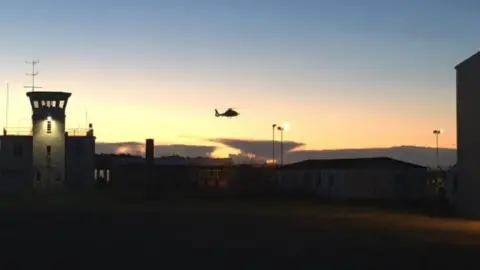 Stobart Group Helicopter hovering over airport