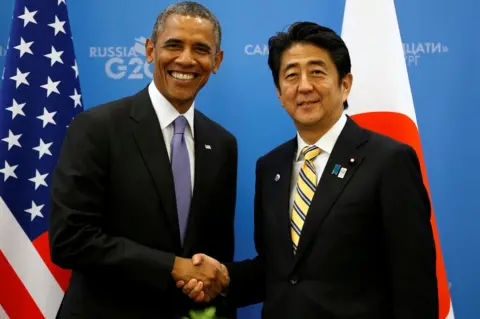 Reuters US President Obama shakes hands with Japanese PM Abe at the G20 Summit in St. Petersburg in 2013