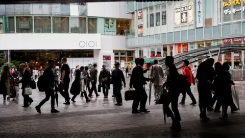 Getty Images Shoppers in Tokyo