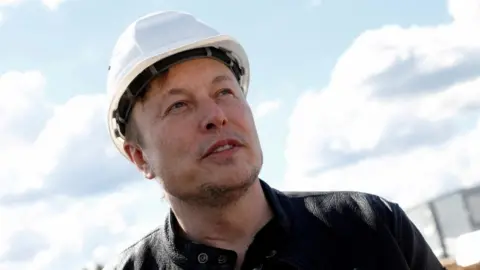 Reuters Elon Musk at site of Tesla's gigafactory in Germany in 2021.