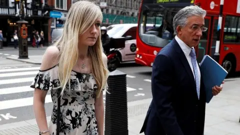 Reuters Connie Yates and her lawyer arrive at the High Court