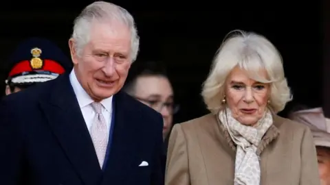 Reuters The King and Queen Consort, pictured in Bolton in January