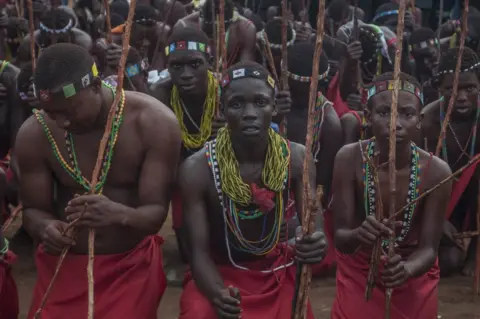 Lucas Ledwaba/AFP Initiates wearing traditional clothing