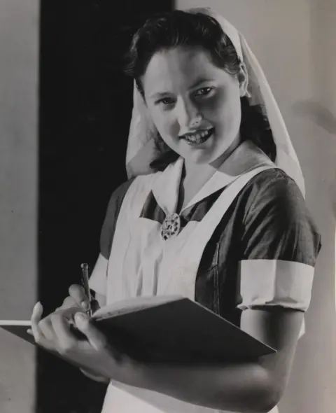 Getty Images A nurse in old-fashioned uniform