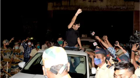 Getty Images Republic TV Editor-in-Chief Arnab Goswami gestures to his supporters after being released from Taloja Central Prison in 2018 Suicide abetment case at Kharghar on November 11, 2020 in Navi Mumbai