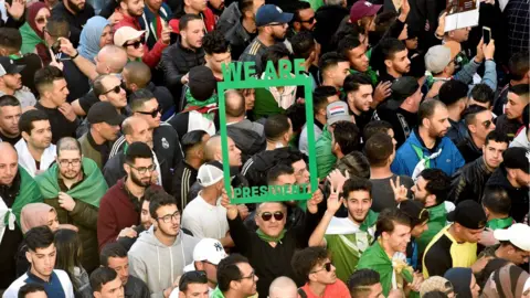 AFP Protesters march through the streets of Algiers