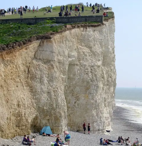 LNP People enjoying the Bank Holiday sun got precariously close to the end of the cliff