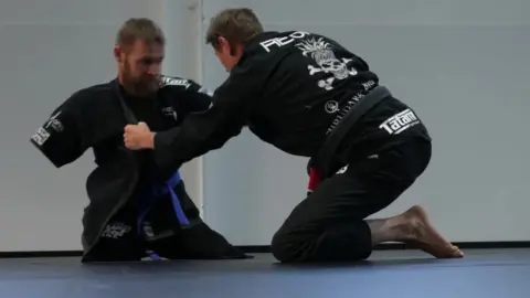 BBC Mark Ormrod taking part in jiu jitsu