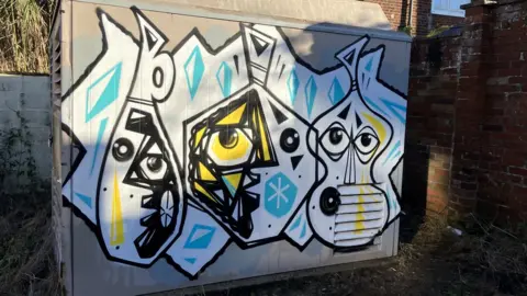 Guy Campbell/BBC One of the murals