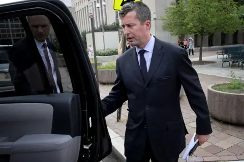 Getty Images Patten in a car