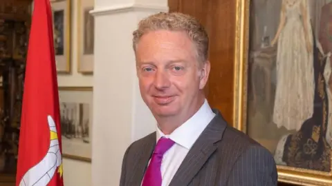 IOM GOVERNMENT Alex Allinson