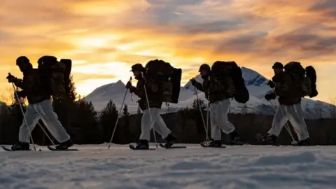 PA Media Royal Marines on cold weather training