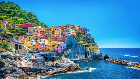 Getty Images Colourful houses in Cinque Terre, Italy