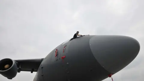 Getty Images Large military transport aircraft Xian Y-20 parks at an air force base after column-mounted air force on July 7, 2016 in Chengdu, Sichuan Province of China.